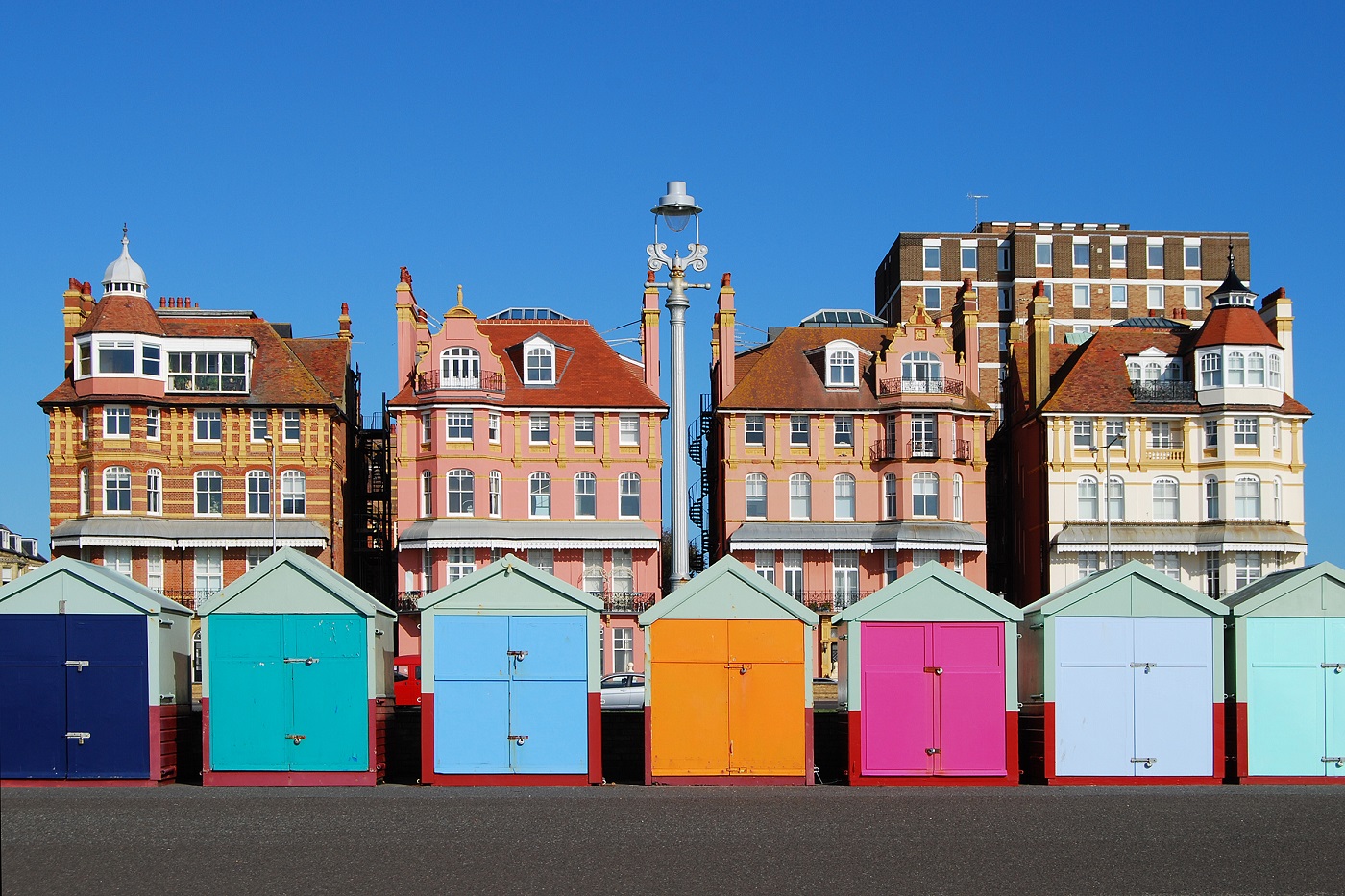 Brighton beach is home to iconic colourful beach huts