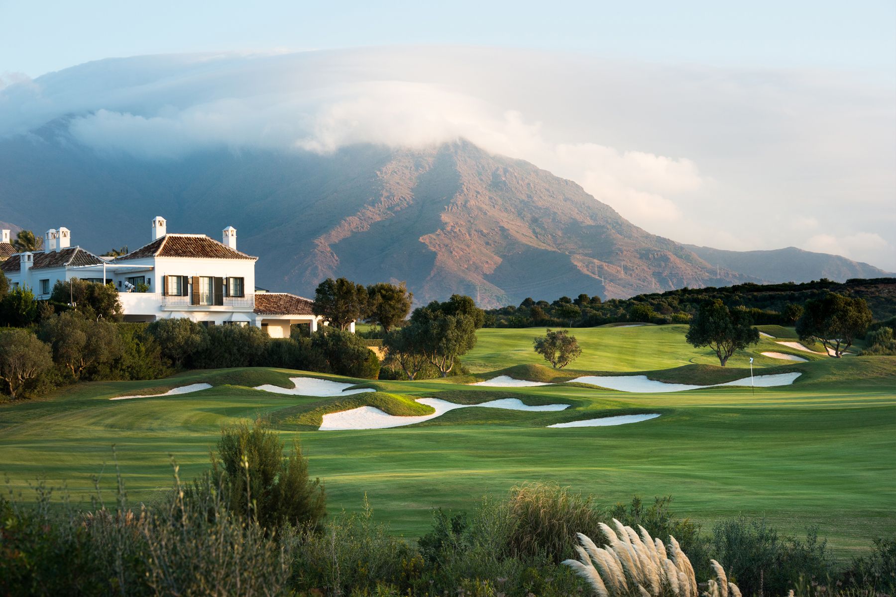 Finca Cortesin Golf Resort villa and golfing green with beautiful mountain