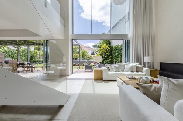 luxury modern high ceiling white open plan living in Portugal dream home