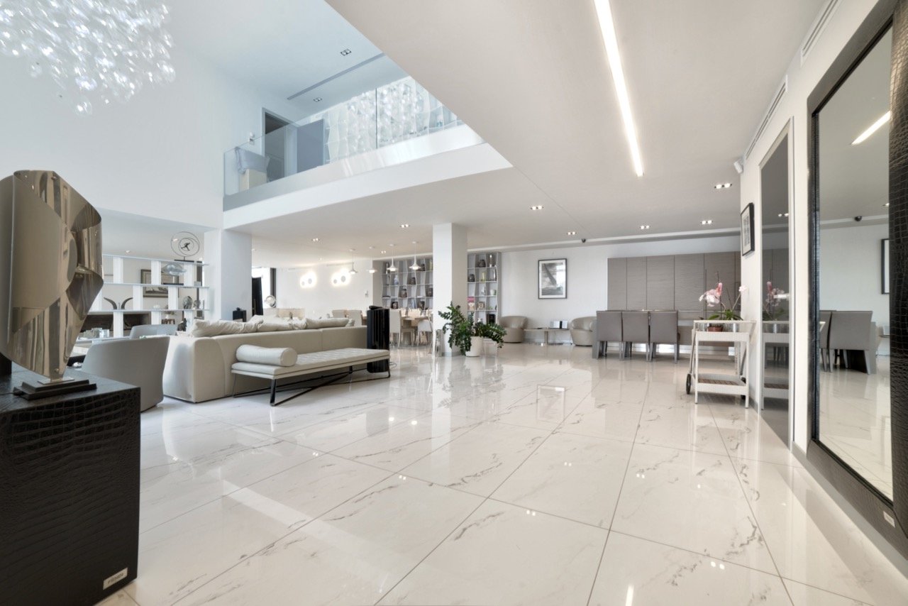 marble flooring open plan kitchen dining living room in luxury Spanish villa