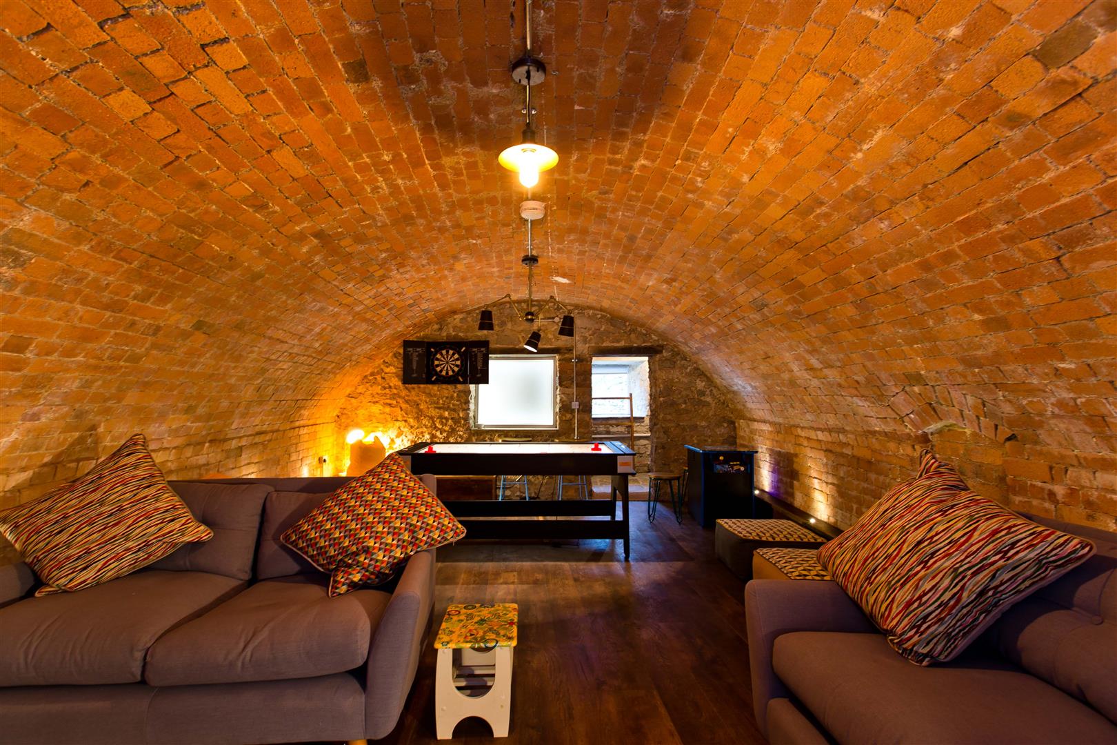 round ceiling converted barn bar and games room