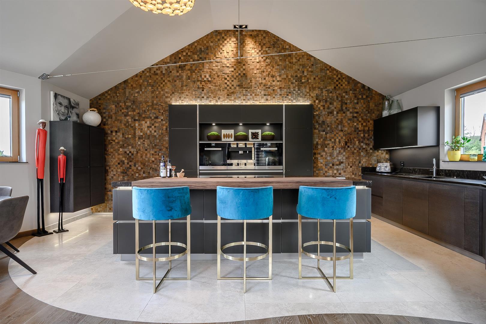 Stunning Contemporary kitchen with blue chairs modern island