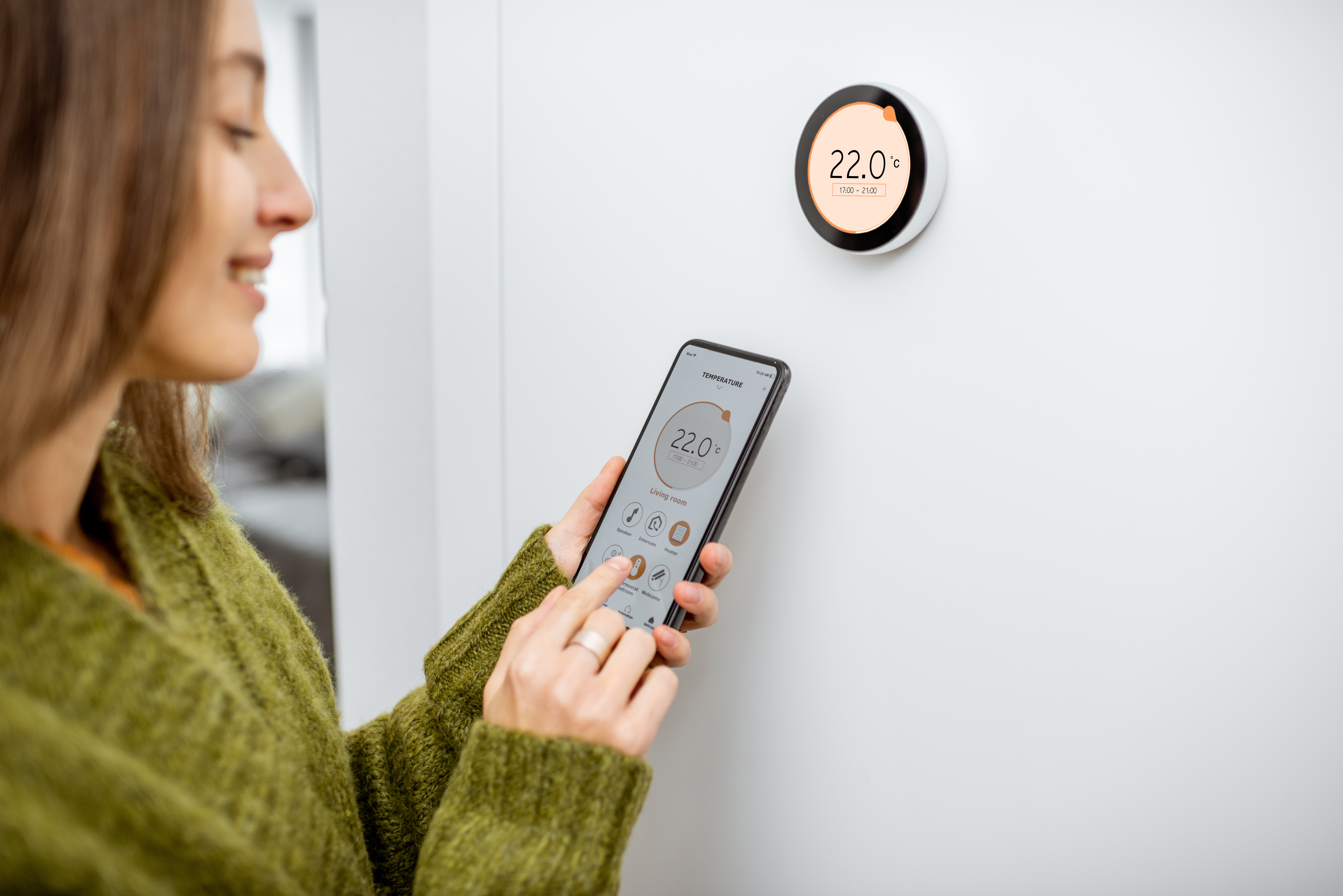 A thermostat controls your home’s temperature by communicating with your boiler.