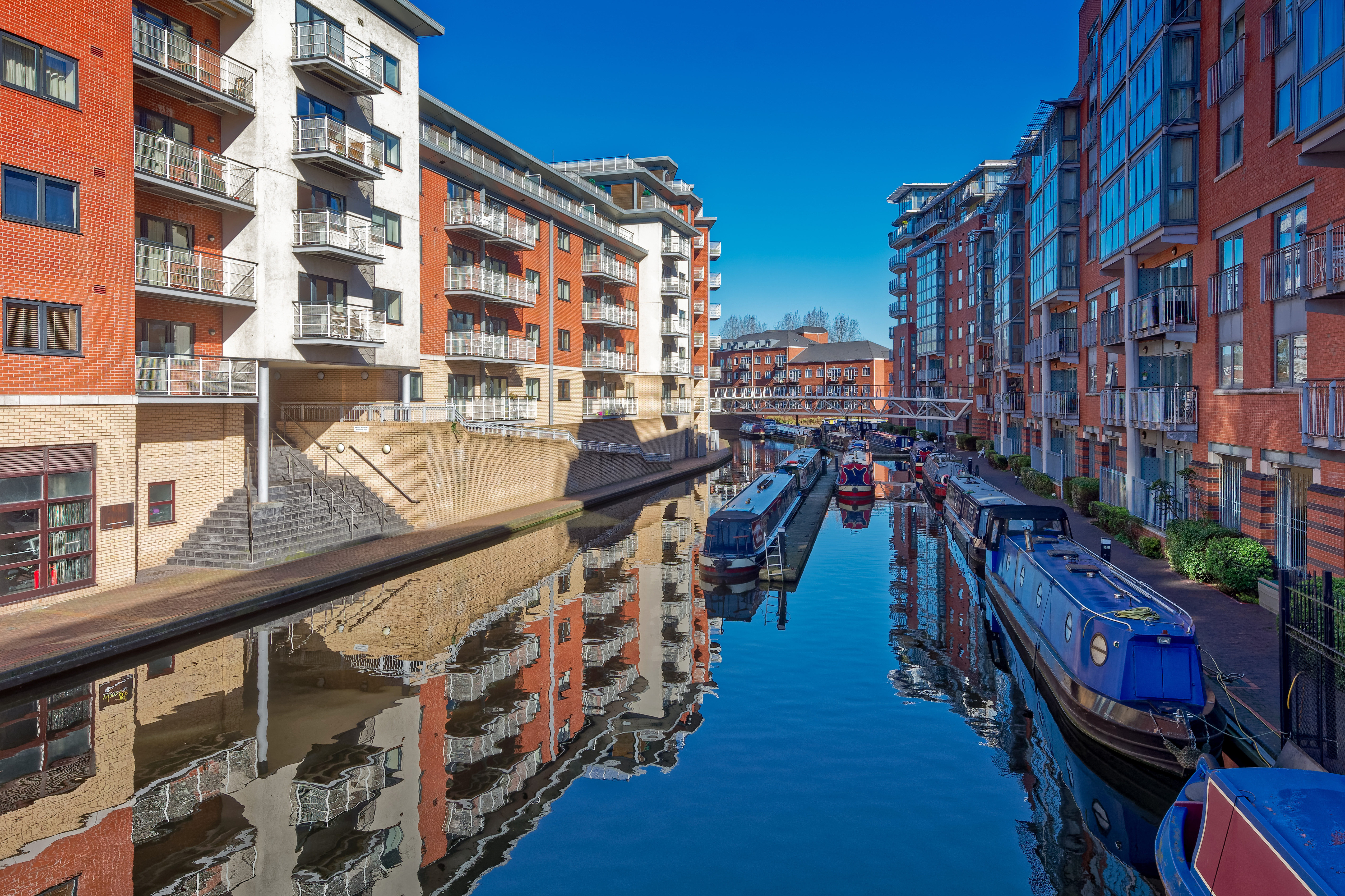 Amazing view on canal network with boats and apartments