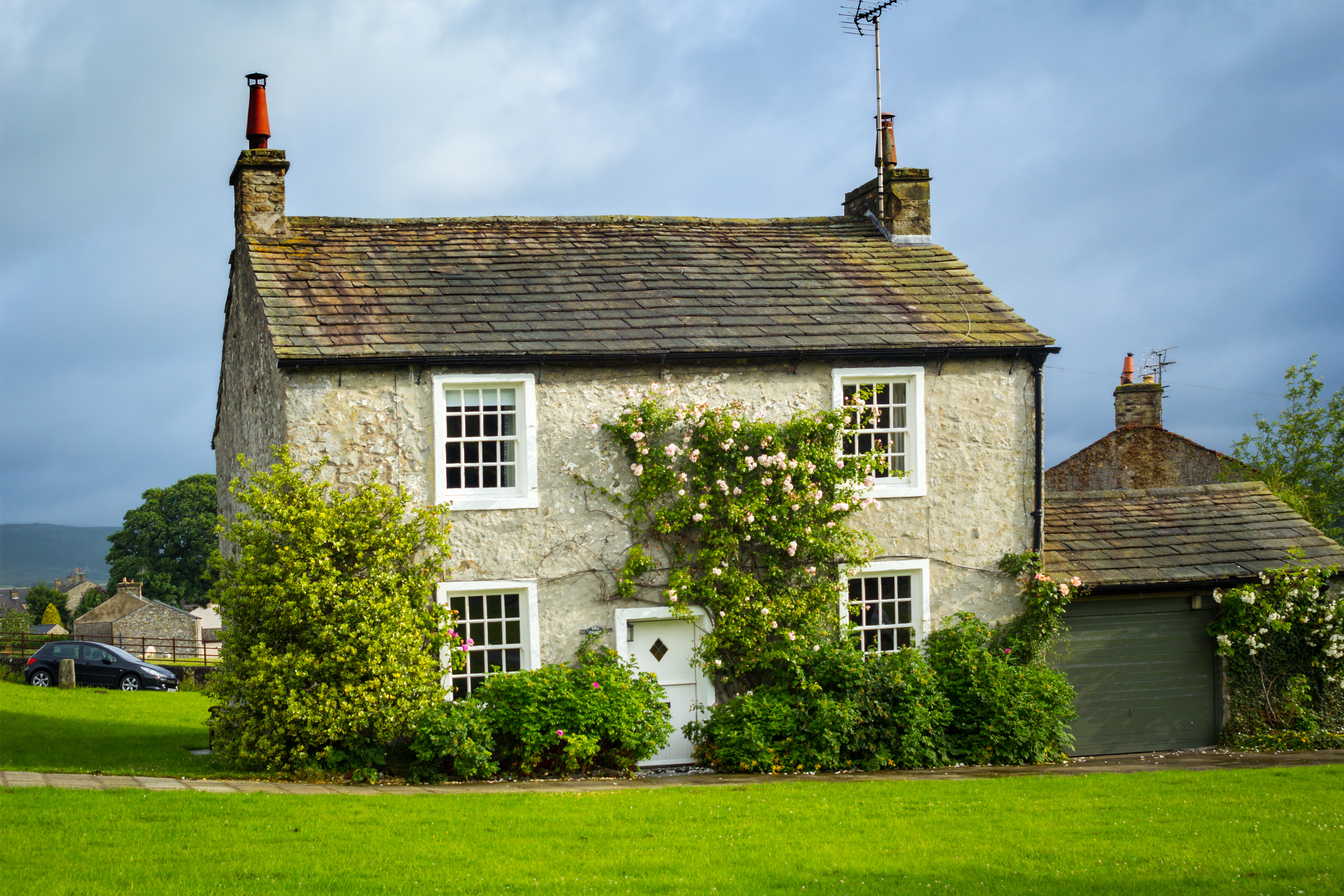 Beautiful English house with climbing roses