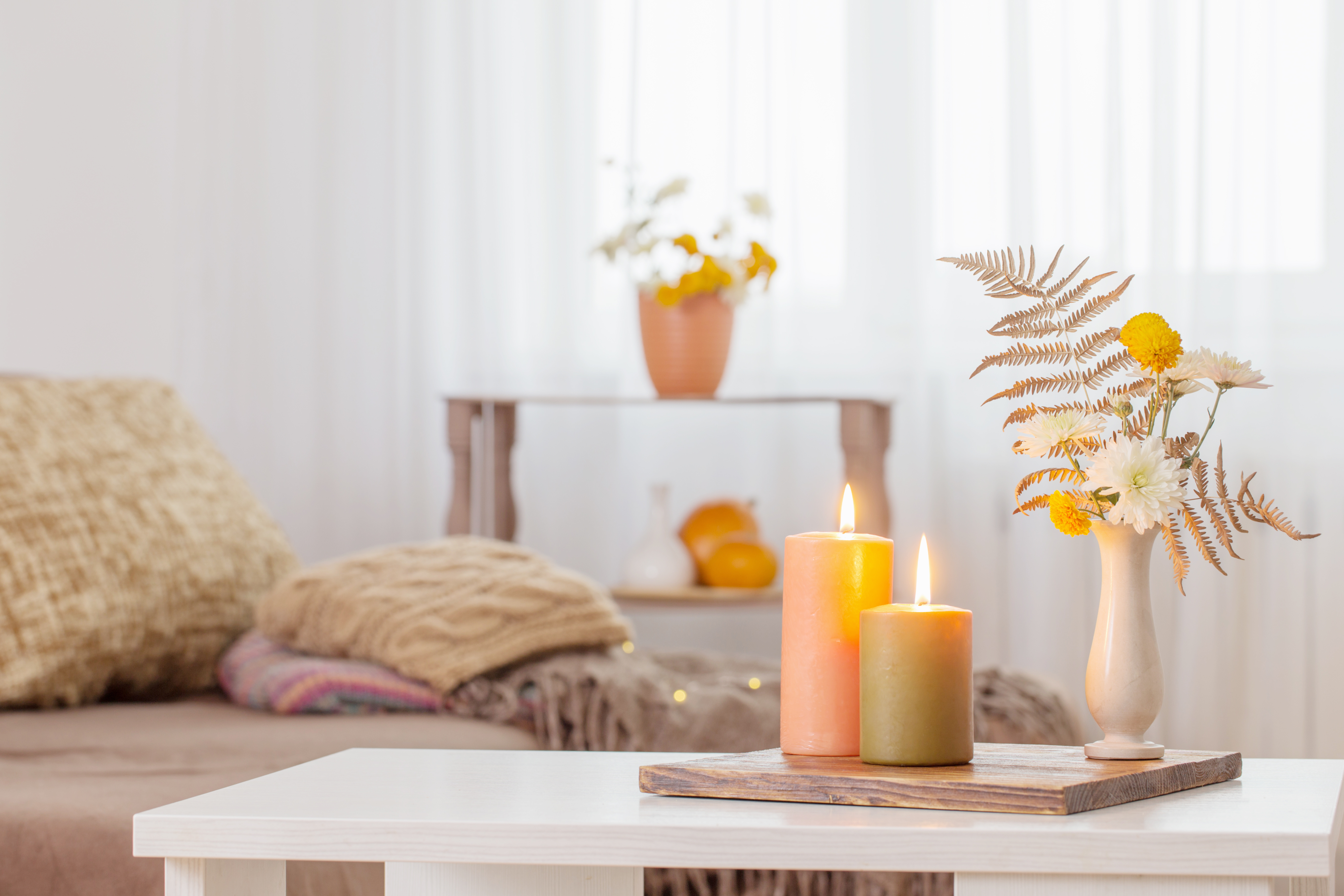 bring a warm and intimate atmosphere to your home with the gentle glow of candles