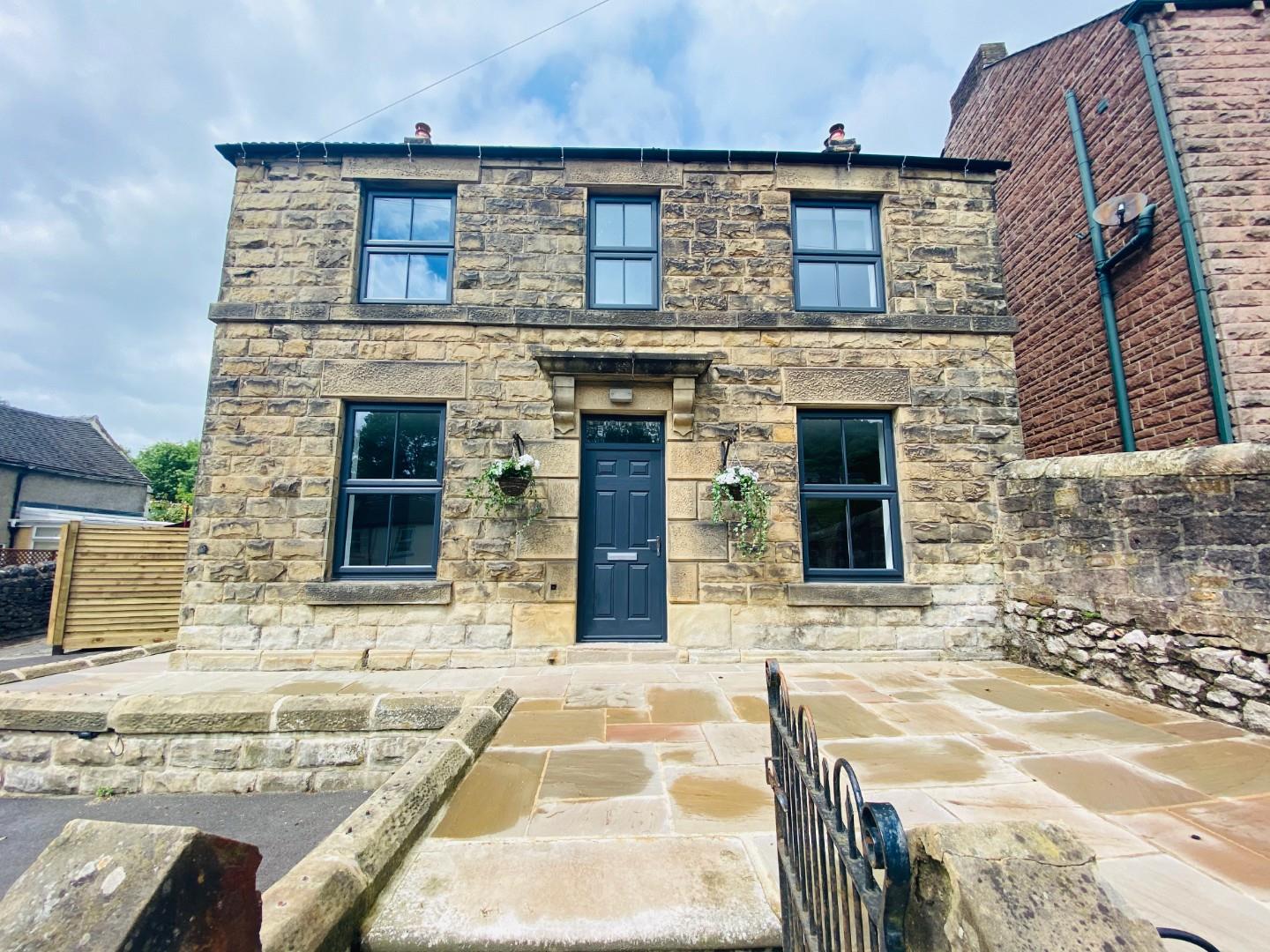 Derbyshire house stone built blue door