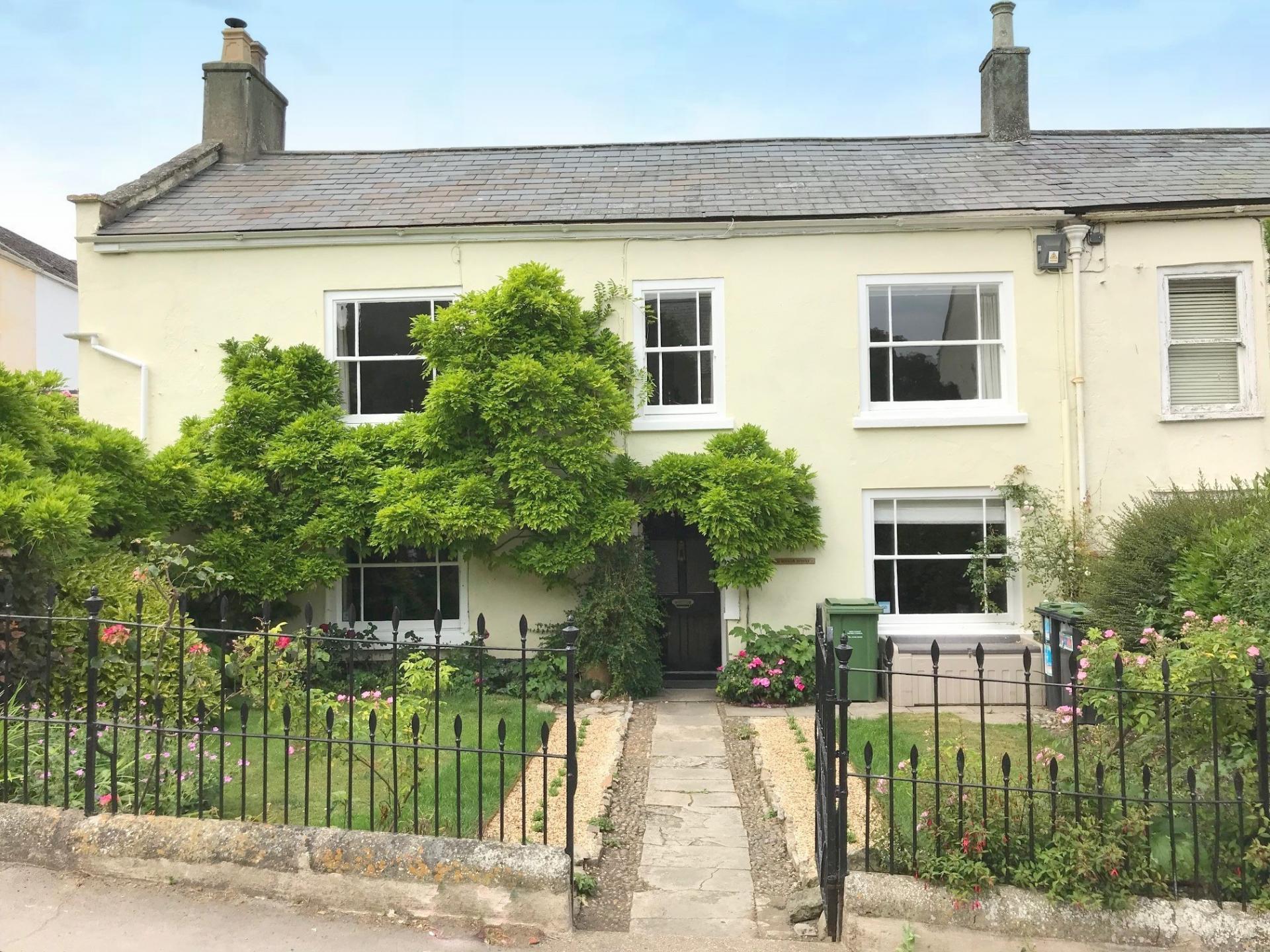 dorset pretty leafy yellow front period house