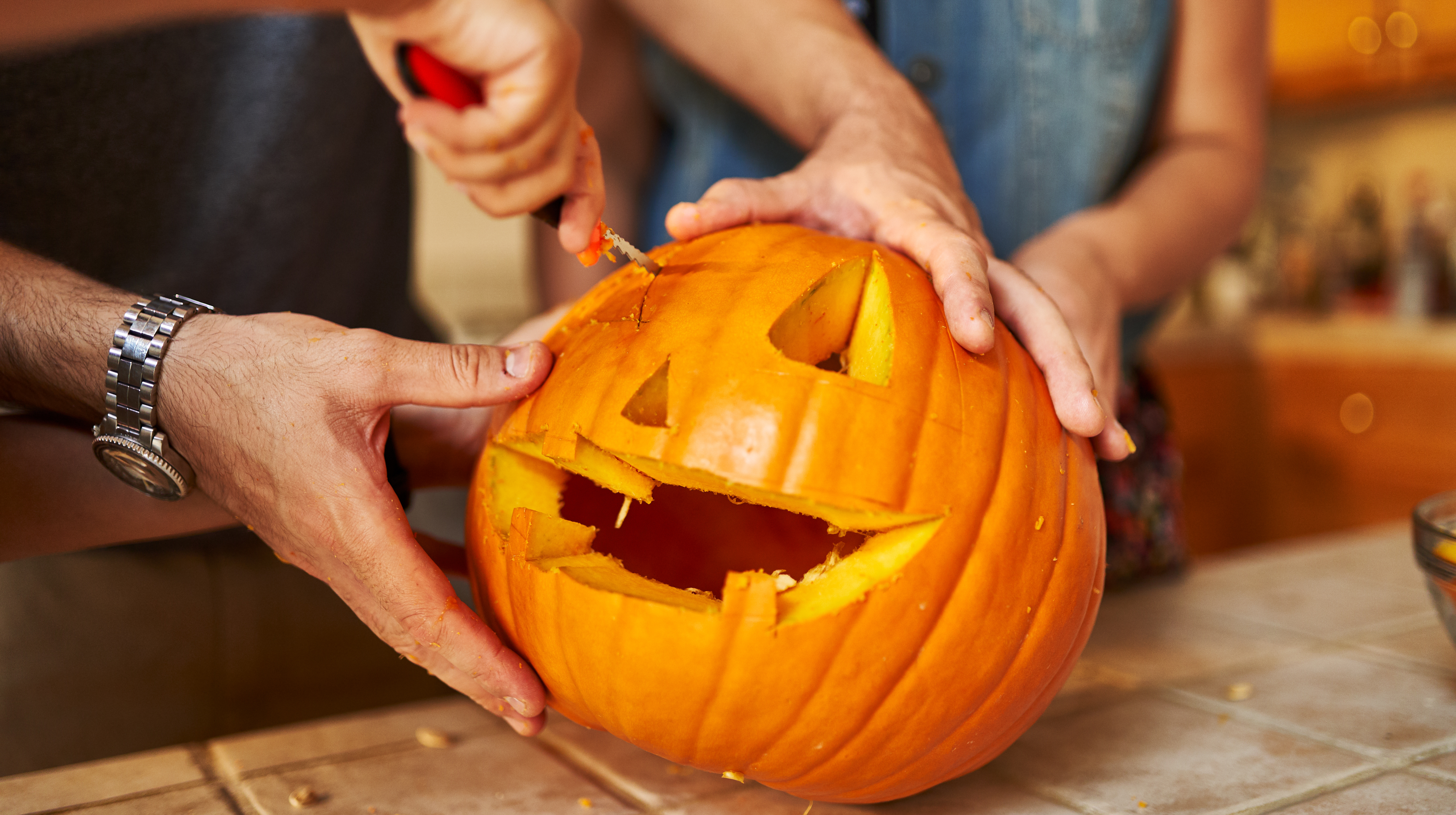 hosting a pumpkin carving competition