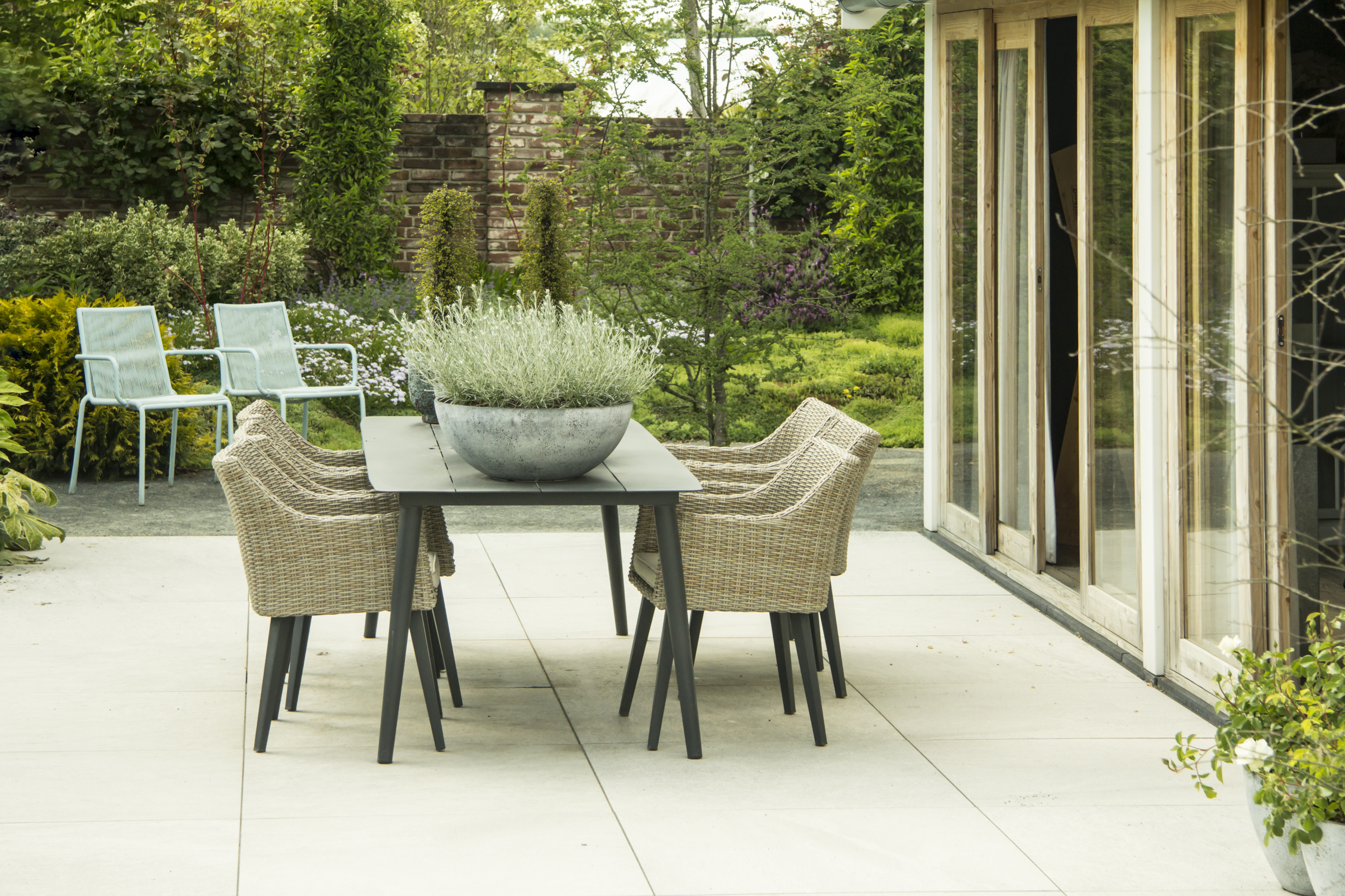 Make use of a patio by adding outdoor funiture