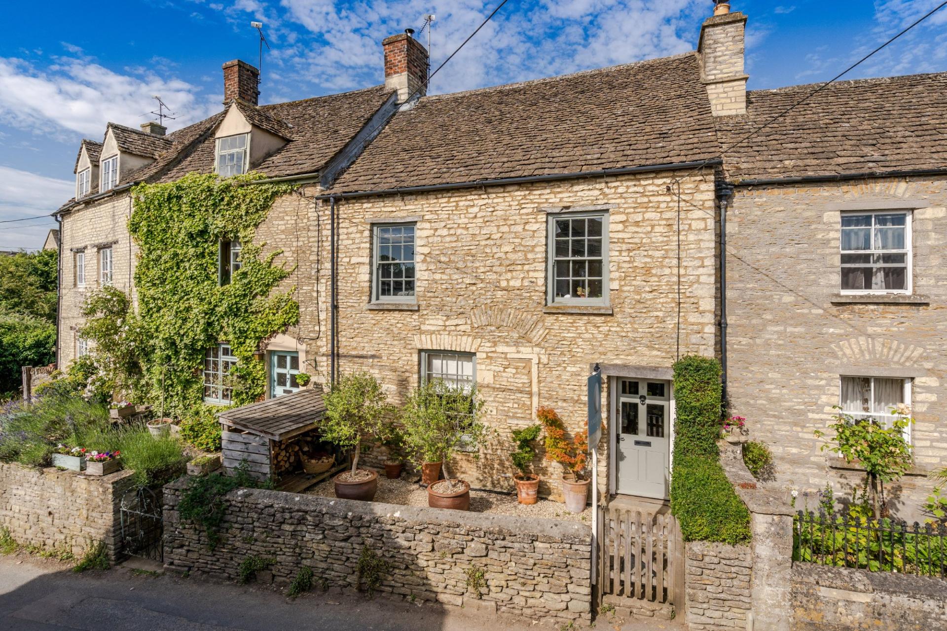 pretty terraced Cotswold stone cottage in Sherston