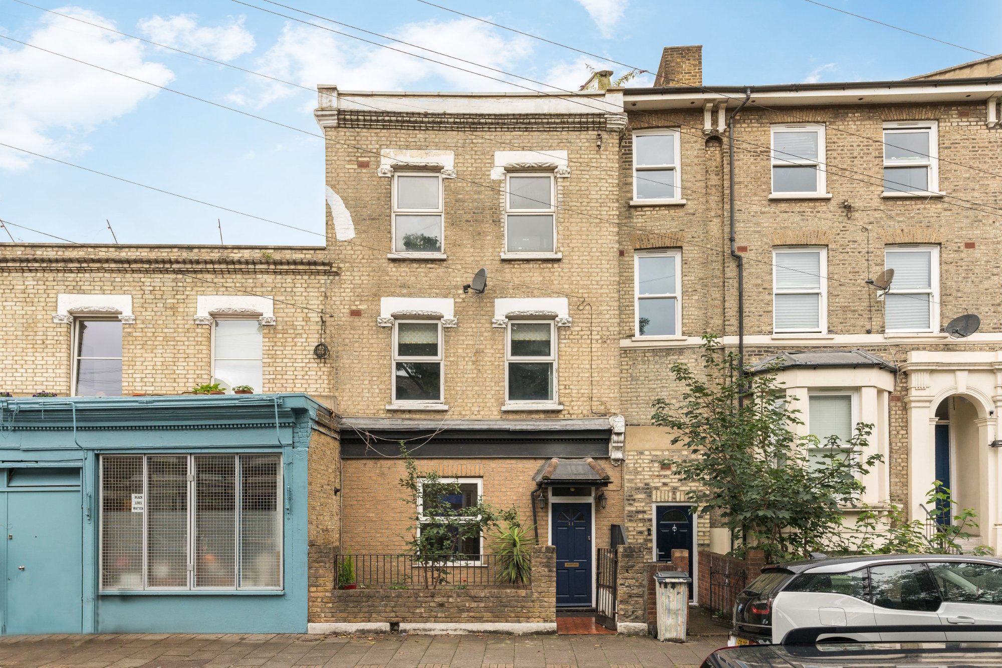 traditional light brick London terraced house