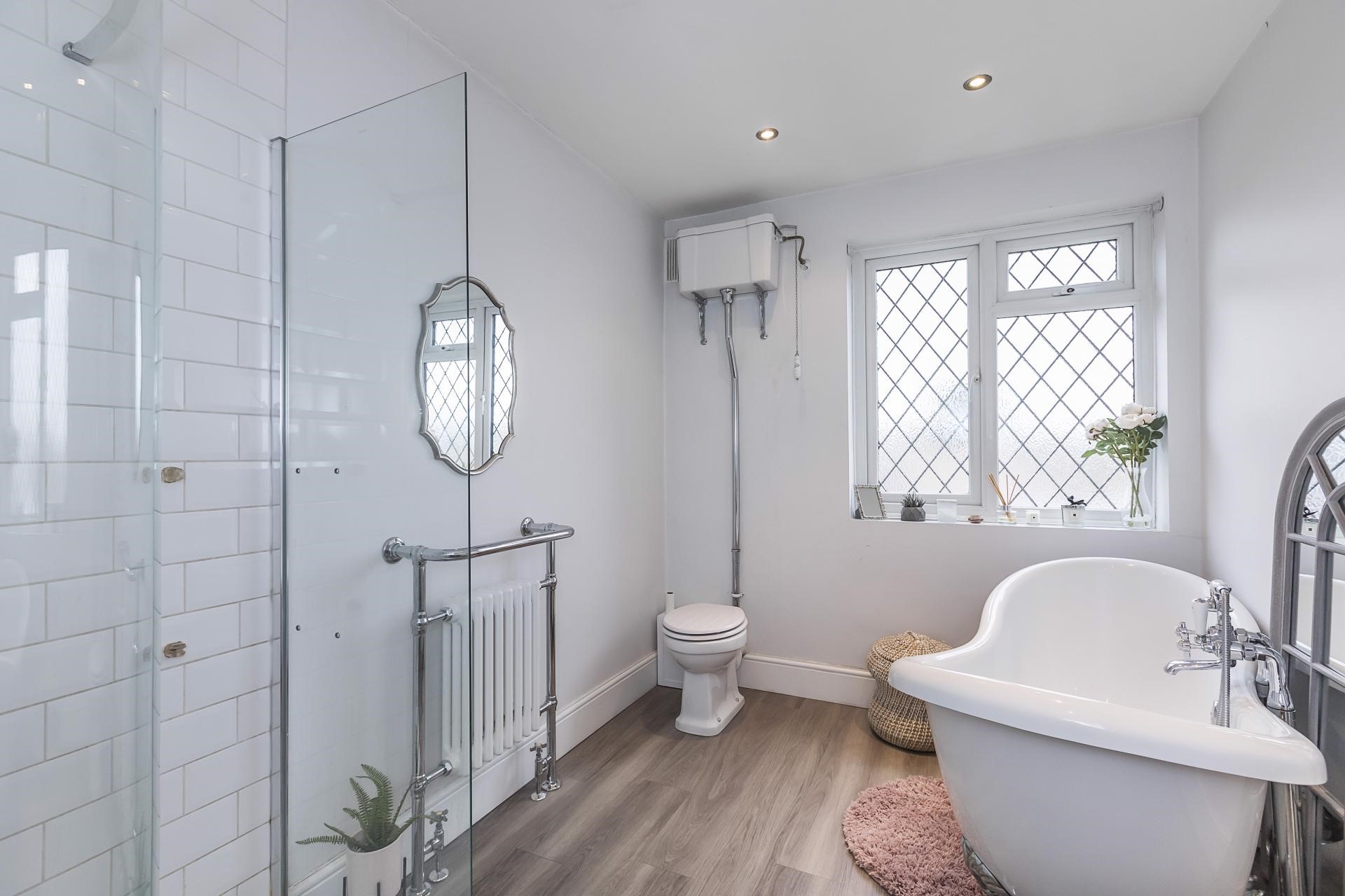 Tudor house simple bathroom renovation oak flooring metro tiles