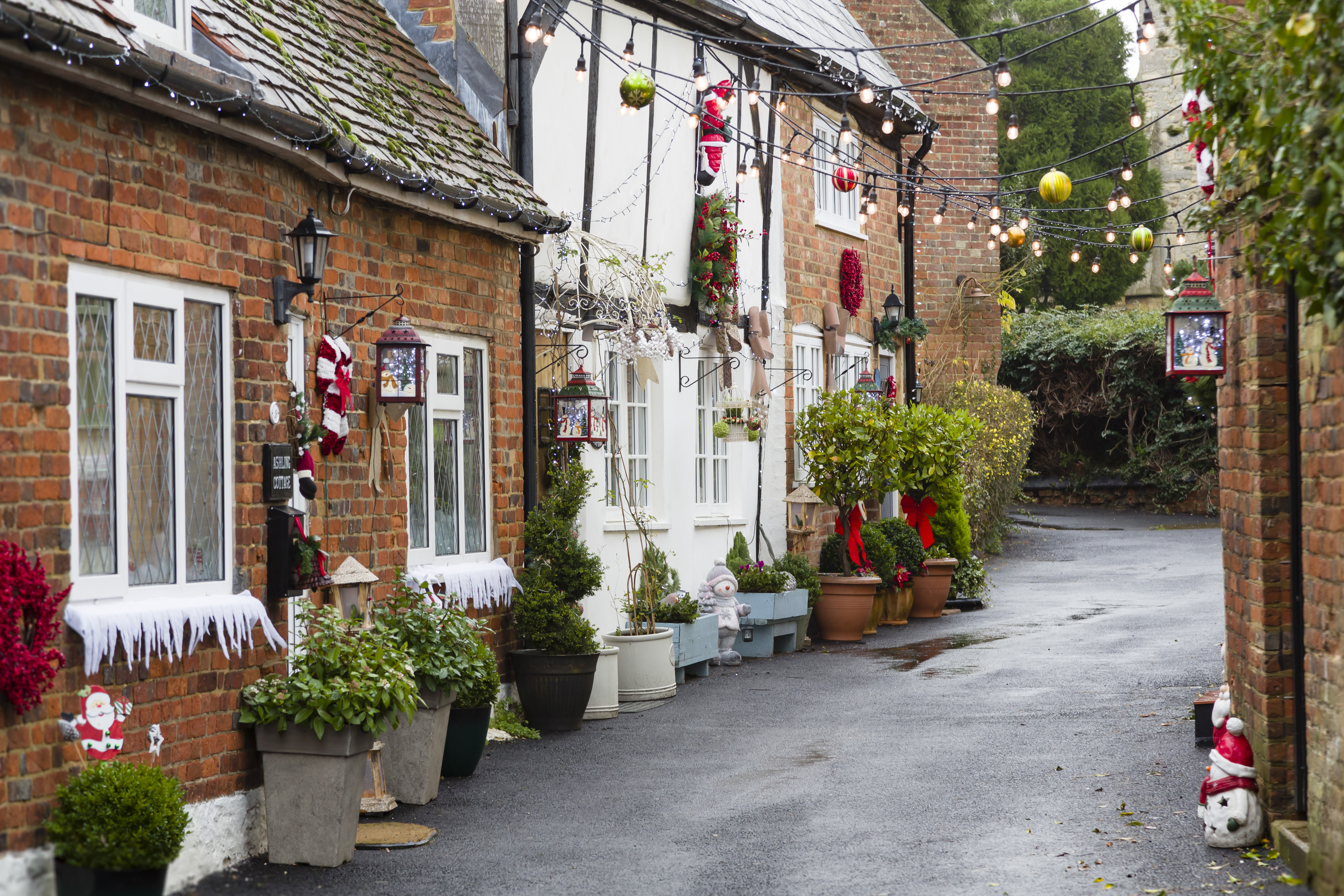 Vintage Christmas street scene old UK town houses