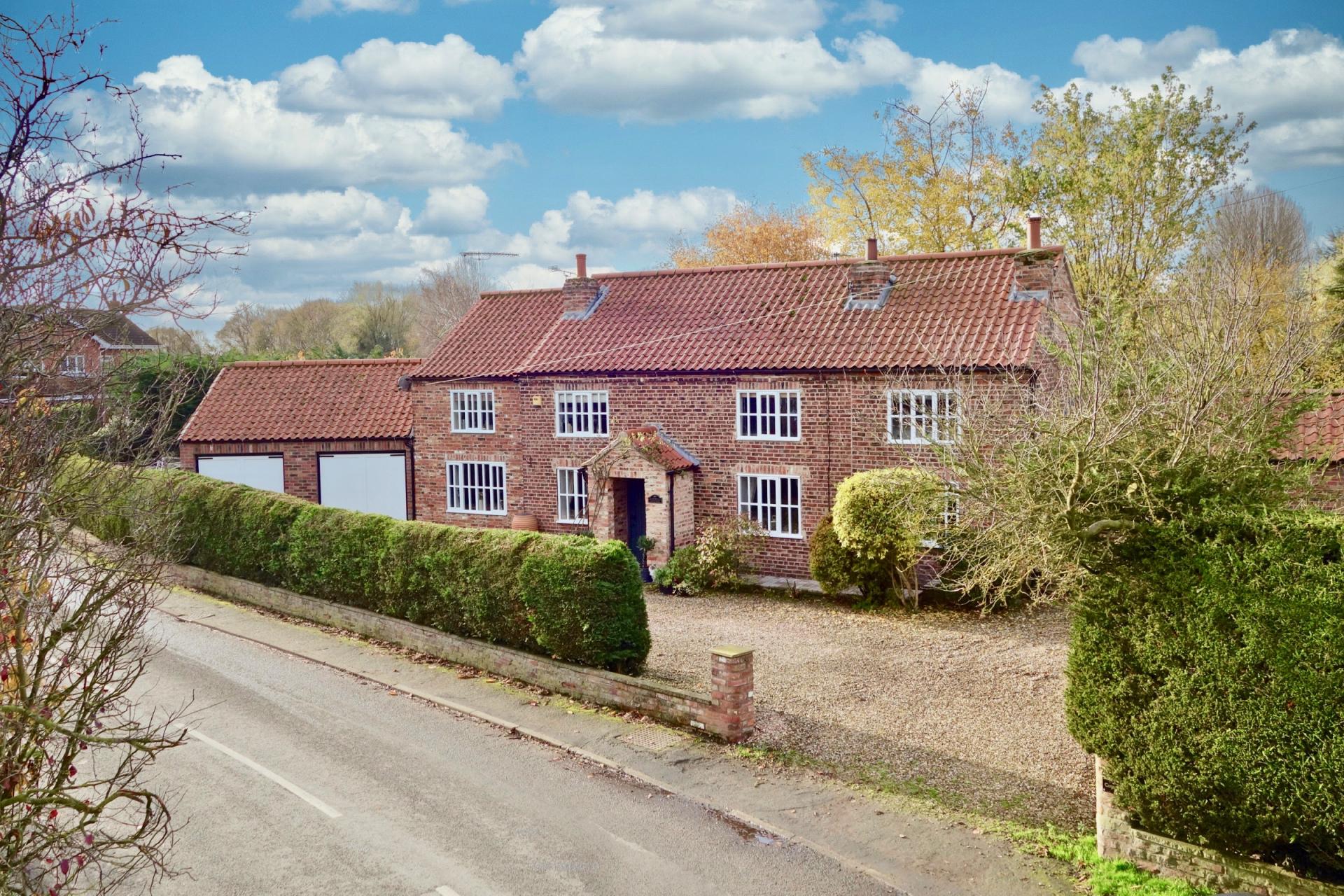 Yorkshire pretty brick built country farmhouse England.jpg