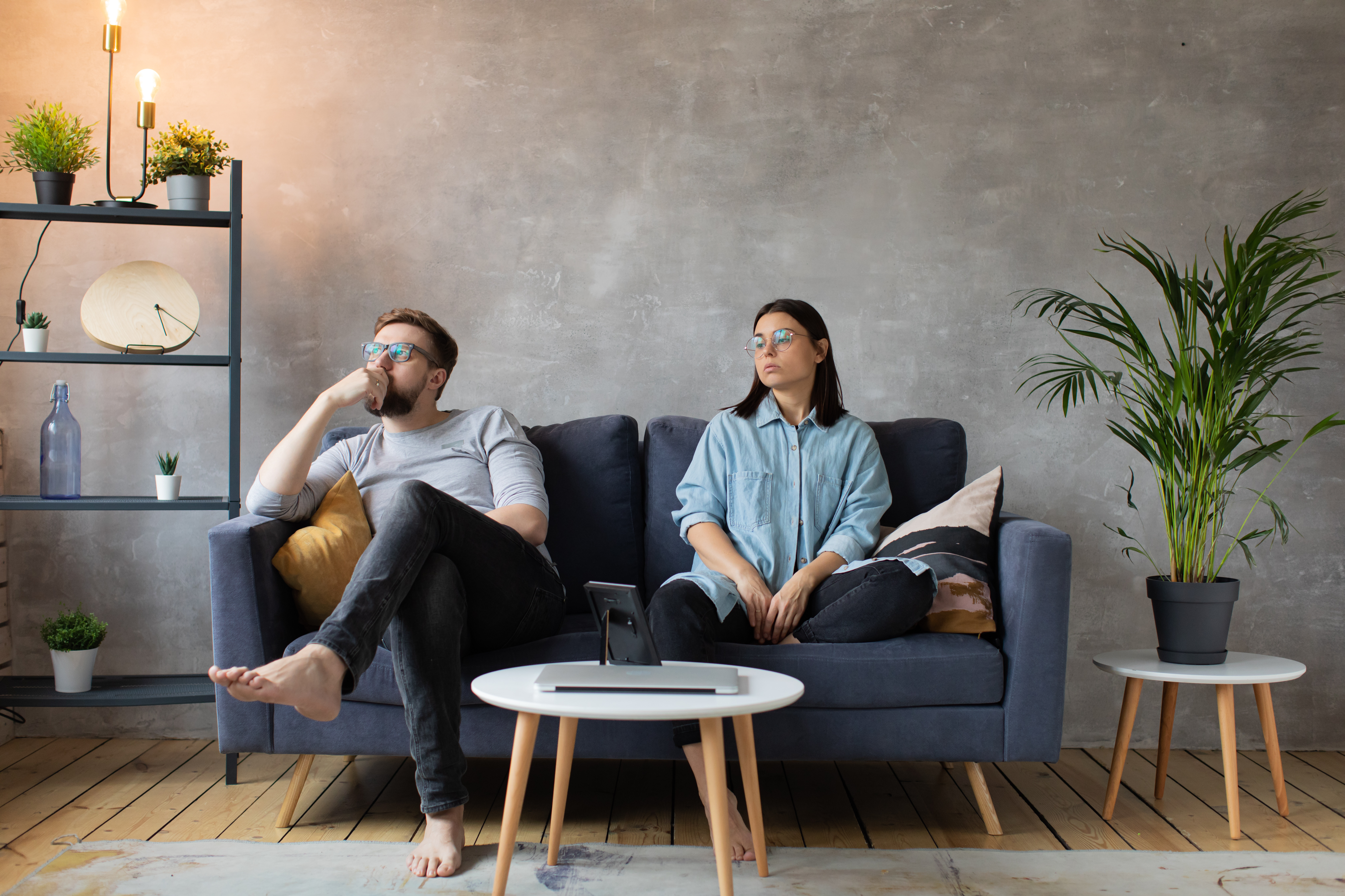 Young Couple Sitting on the Sofa