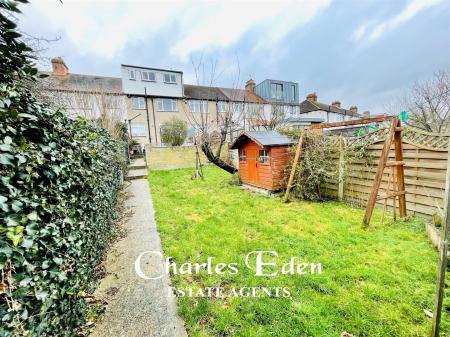 Garden from bottom looking towards house LOGO.jpg