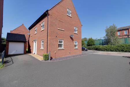 Side Elevation (Driveway & Garage)