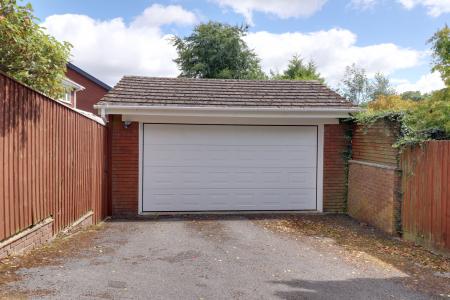 Double Garage To The Rear