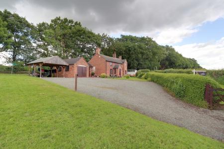 Front/Side Elevation & Garden