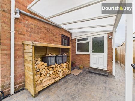 Rear Porch/Log Store