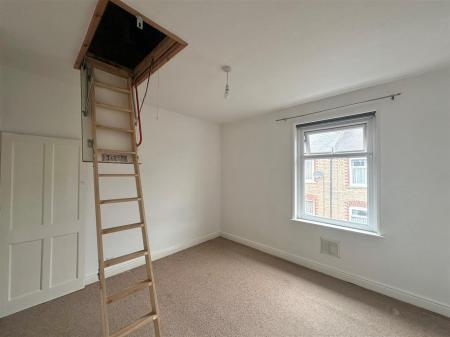 bedroom with loft ladder.jpg