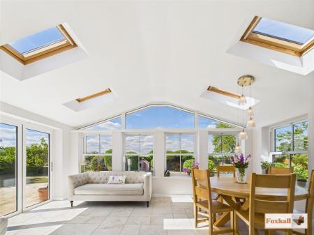 Open Plan Sitting/Dining Room In Orangery Style
