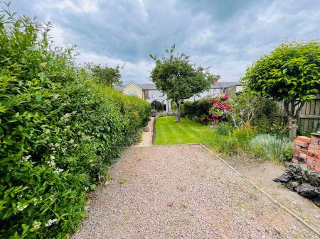 Rear garden & parking area