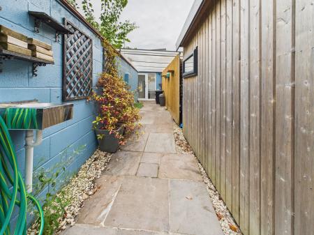 Covered walk way to garden