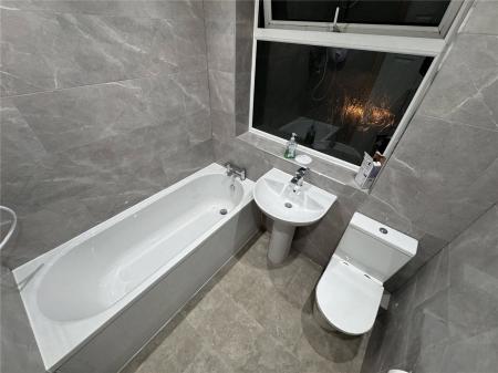 Fully Tiled Bathroom