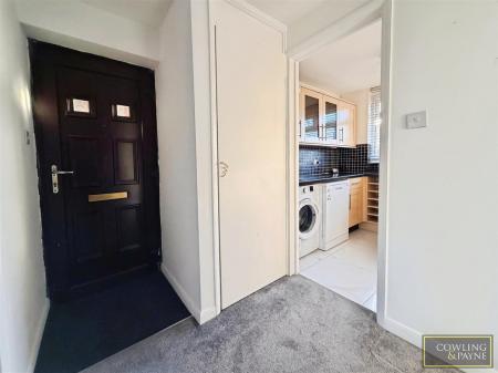 Iterior Front Door & Kitchen