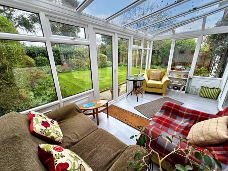 Conservatory with Garden Beyond