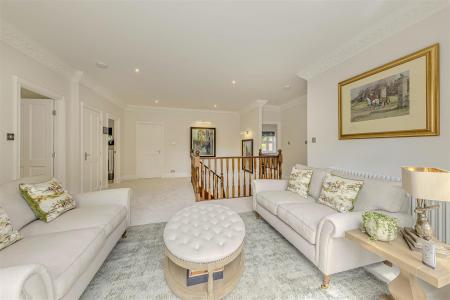 Generous First-Floor Landing with Lake Views