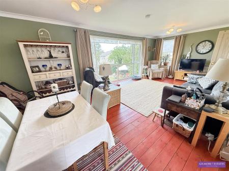 L Shaped Lounge through Dining Room