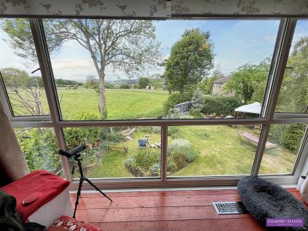 L Shaped Lounge through Dining Room