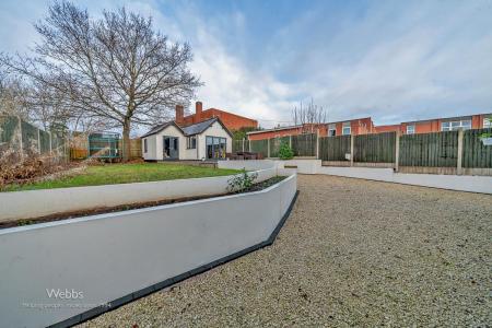 rear garden and garden building