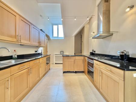 Kitchen with vaulted ceilings