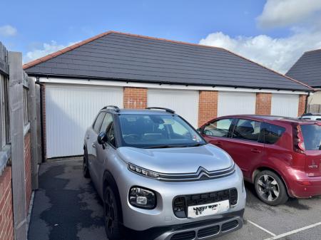 Garage + Parking Space