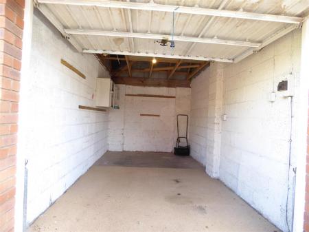 Garage to rear  & Drive En Bloc