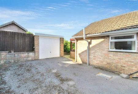 Brick Detached Tandem Garage