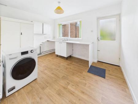 Utility Room Leading to Garage And Garden