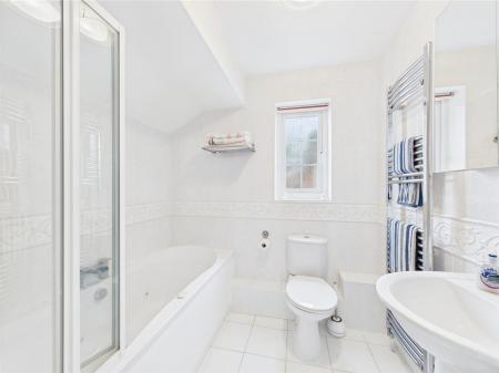 Family Bathroom With Jacuzzi Bath And Shower