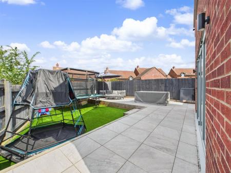 Superb Patio Area & Astro Turf Lawn