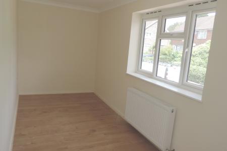 upstairs bedroom - front - left.jpg