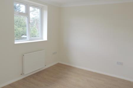 upstairs bedroom - rear - left.jpg