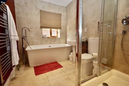Bathroom with separa