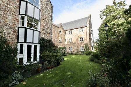 Garden and rear elev