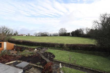 Rear garden and fiel