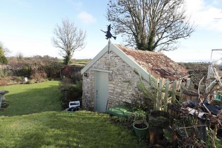 Garden and outbuildi