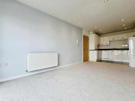 Living area to kitchen